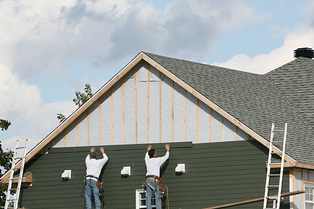 Professional Vinyl Siding technician working in Belmont, PA